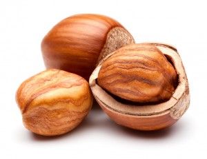 Closeup of hazelnuts, isolated on the white background, clipping path included.